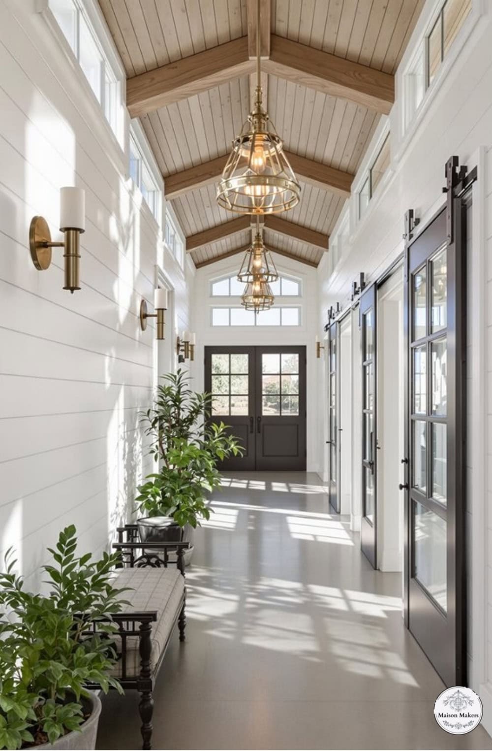 a long hallway with a light fixture hanging from the ceiling