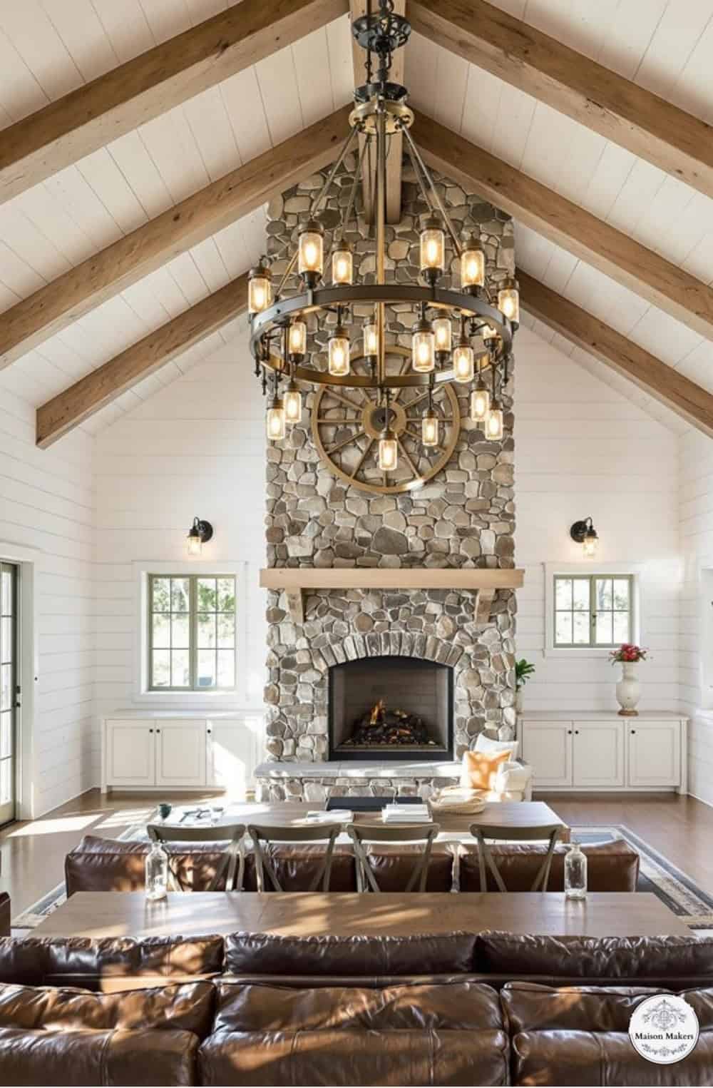 a living room filled with furniture and a fire place
