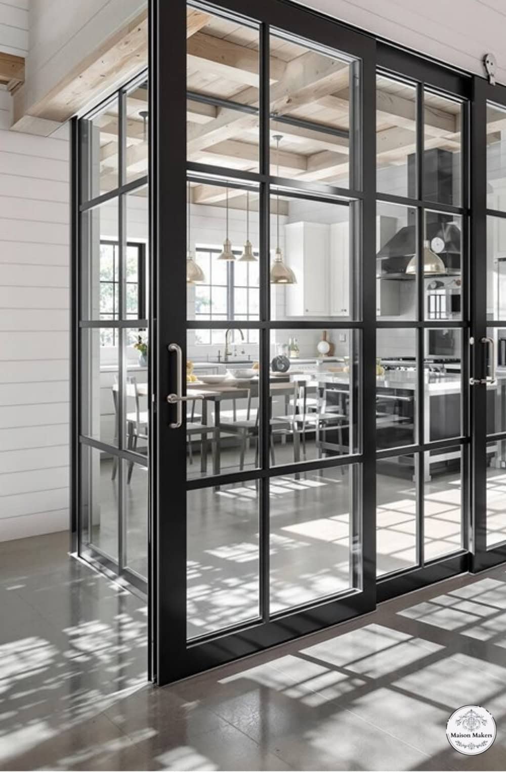 a large open glass door in a kitchen