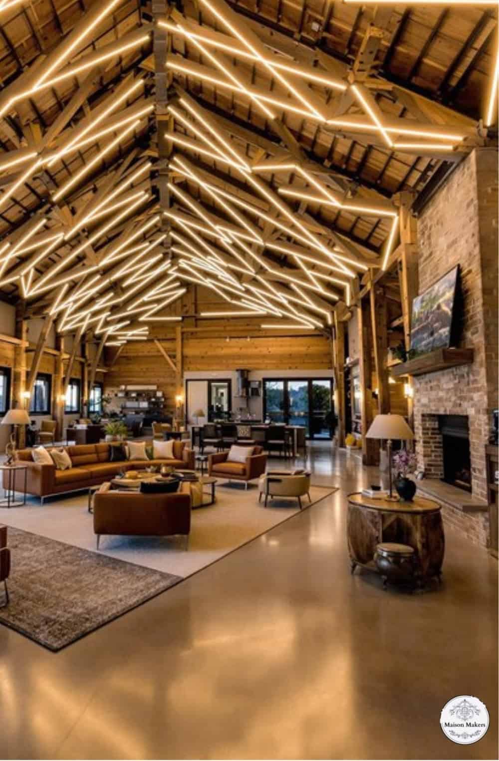 a large living room with a ceiling made of wooden beams