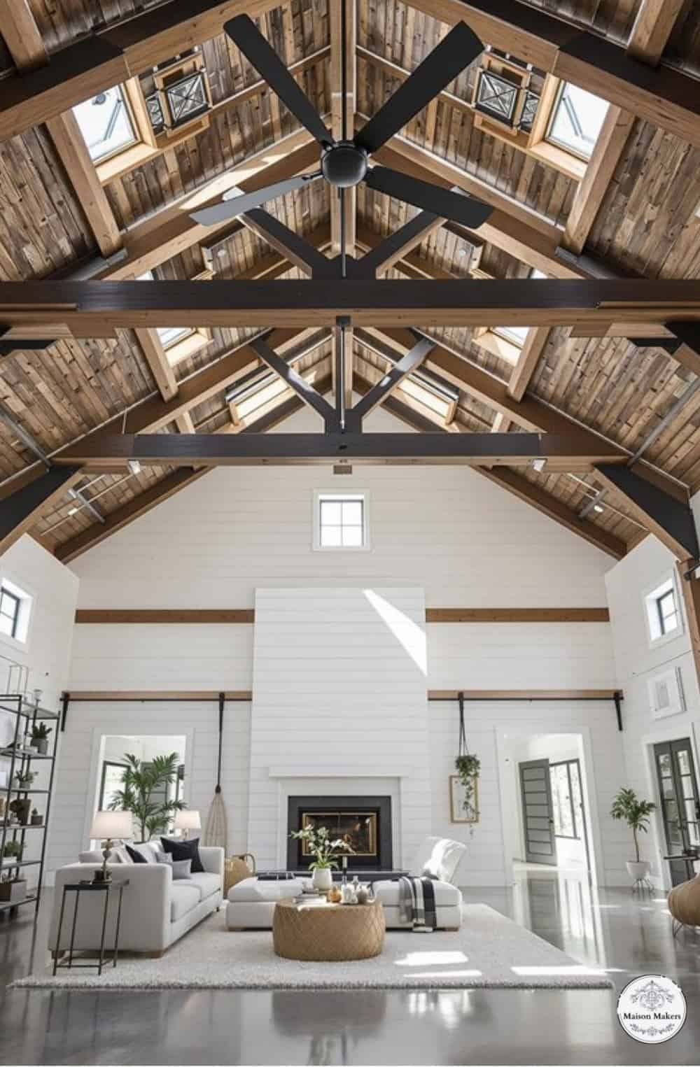 a large open living room with a vaulted ceiling