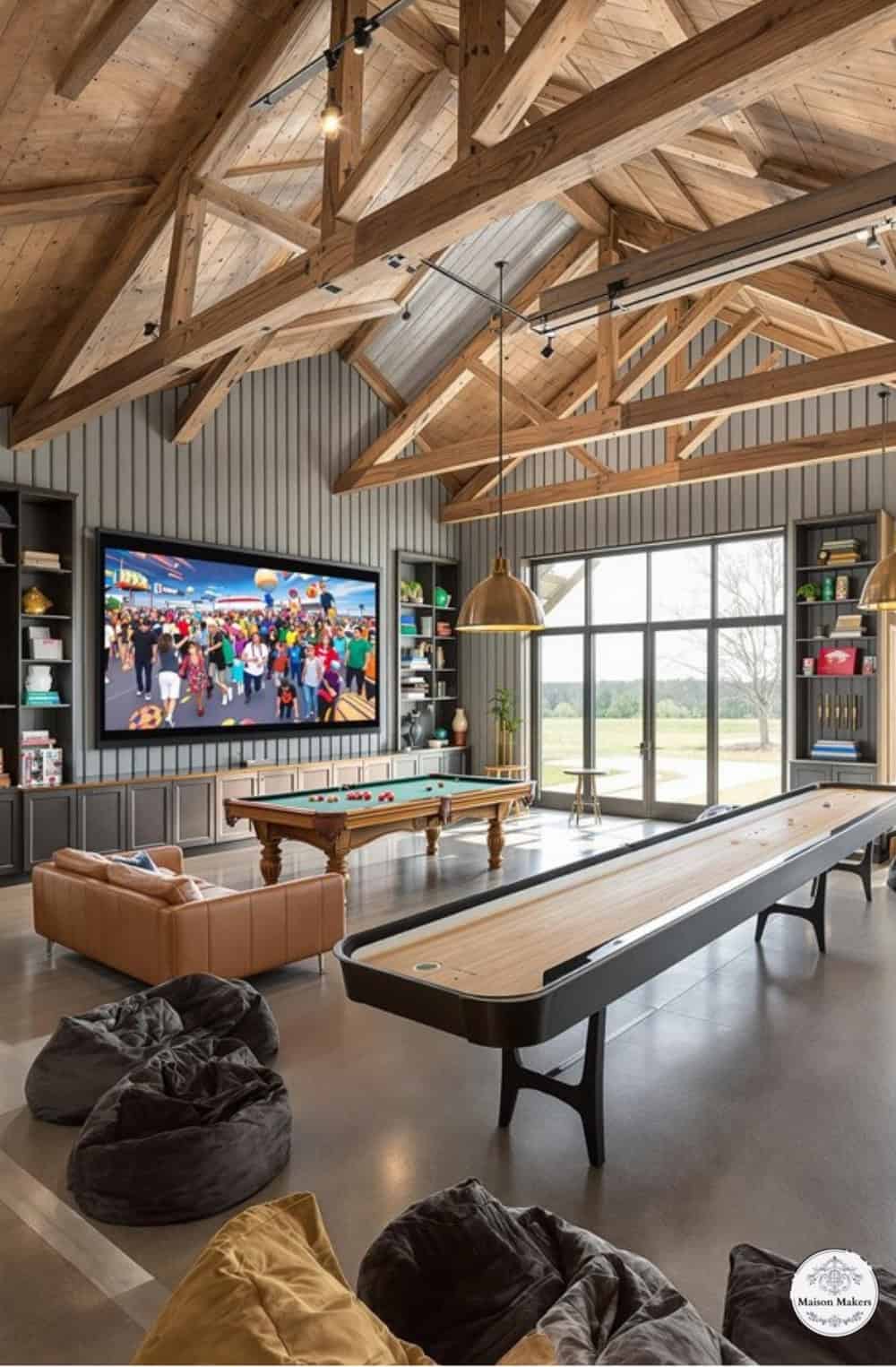 a room with a pool table, couches and a television