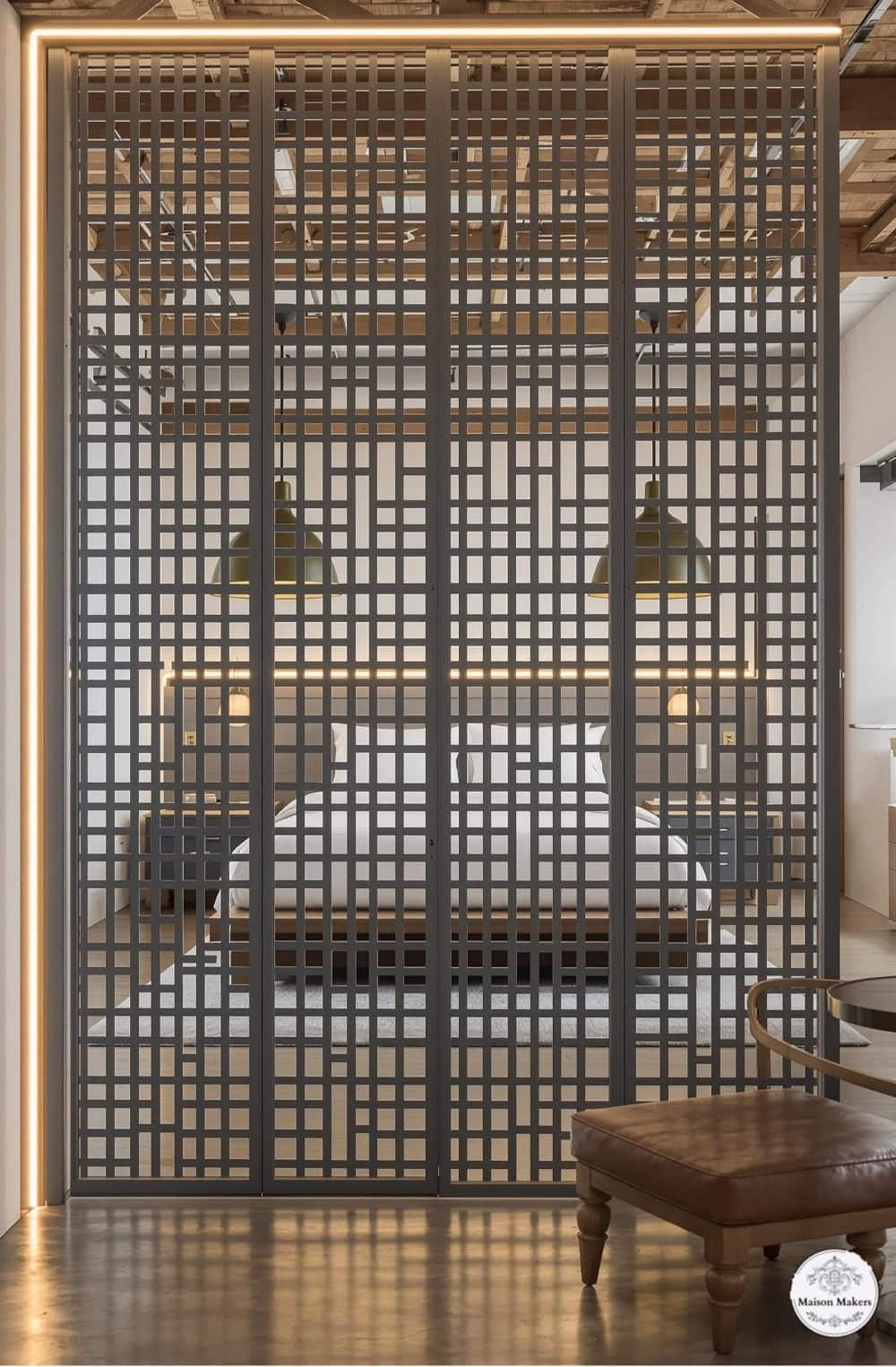 a room with a bed and a chair in it