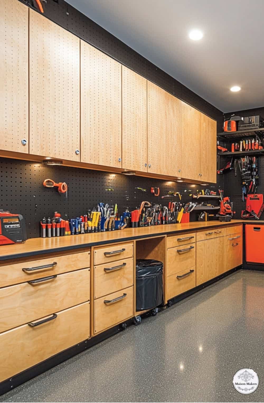 a garage filled with lots of tools and cabinets