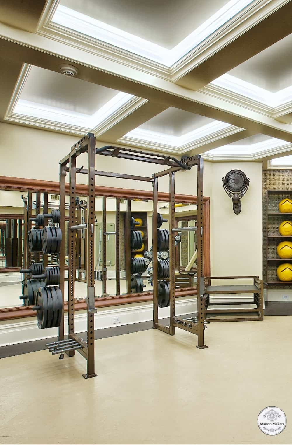 a gym with a row of exercise equipment