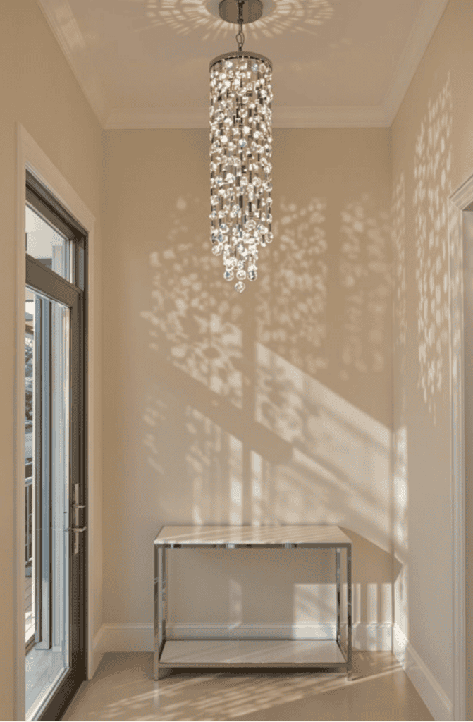 a chandelier hanging from a ceiling in a room