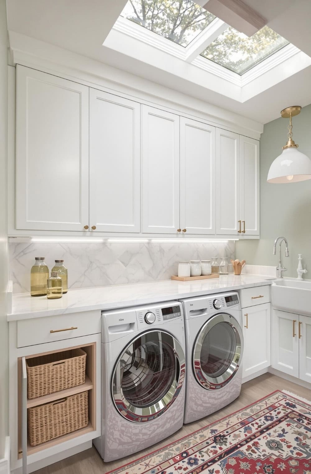 a washer and dryer in a white laundry room