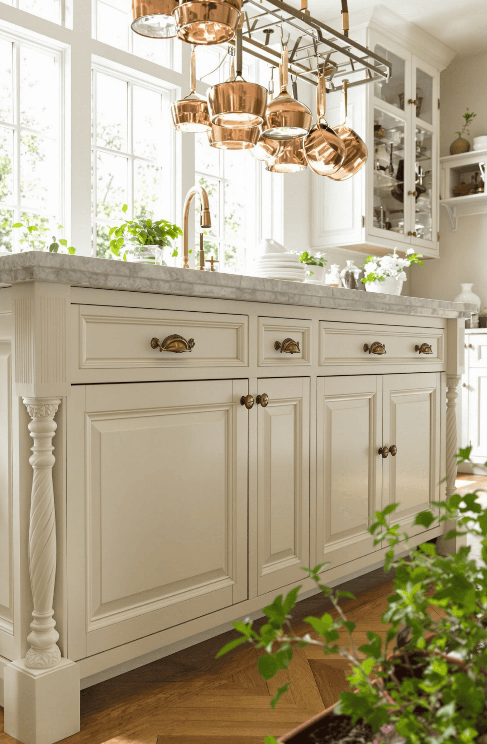 a kitchen with a sink and a potted plant