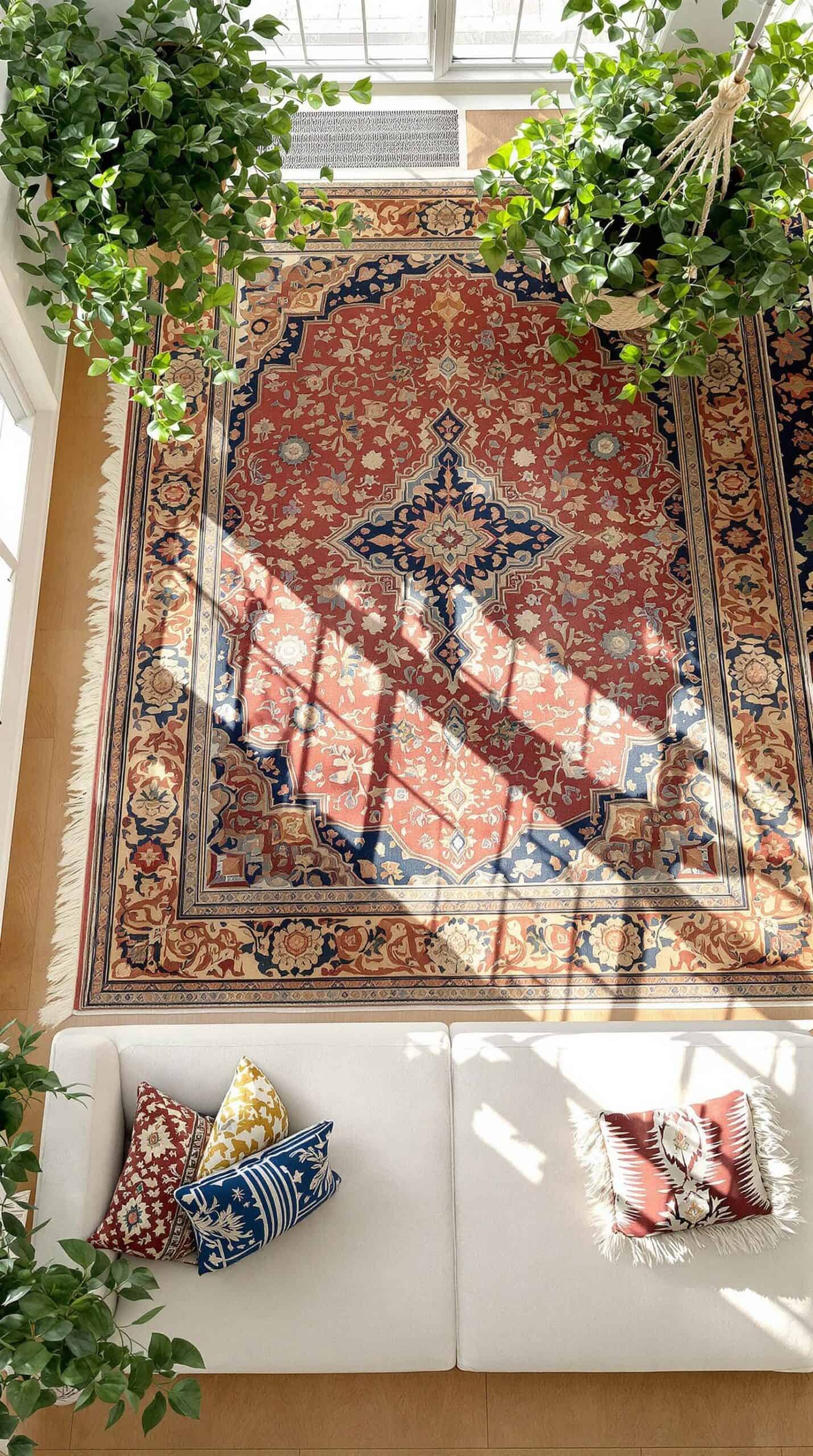 a room with a large rug hanging from the ceiling