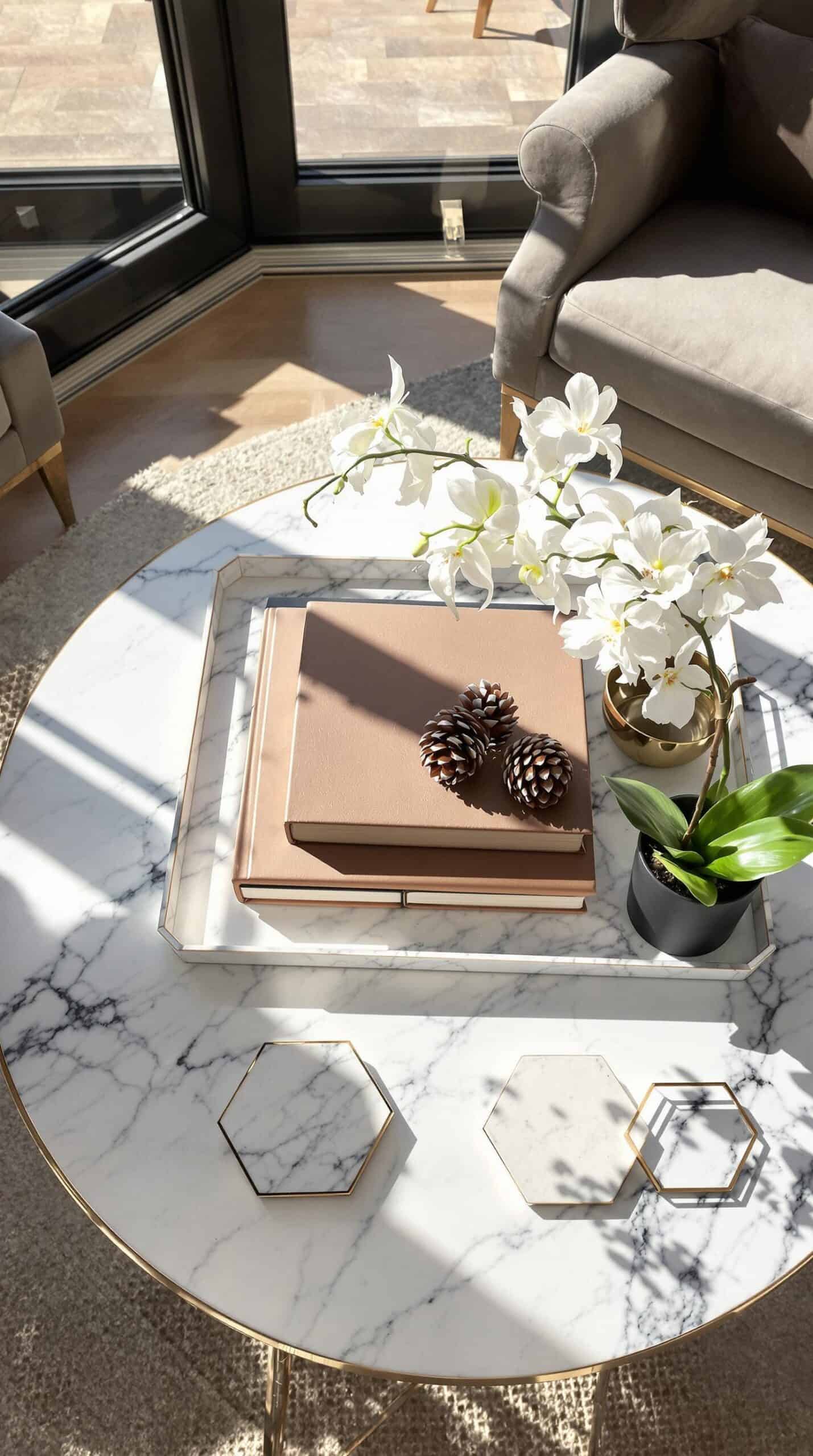 a table with a vase of flowers and a book on it