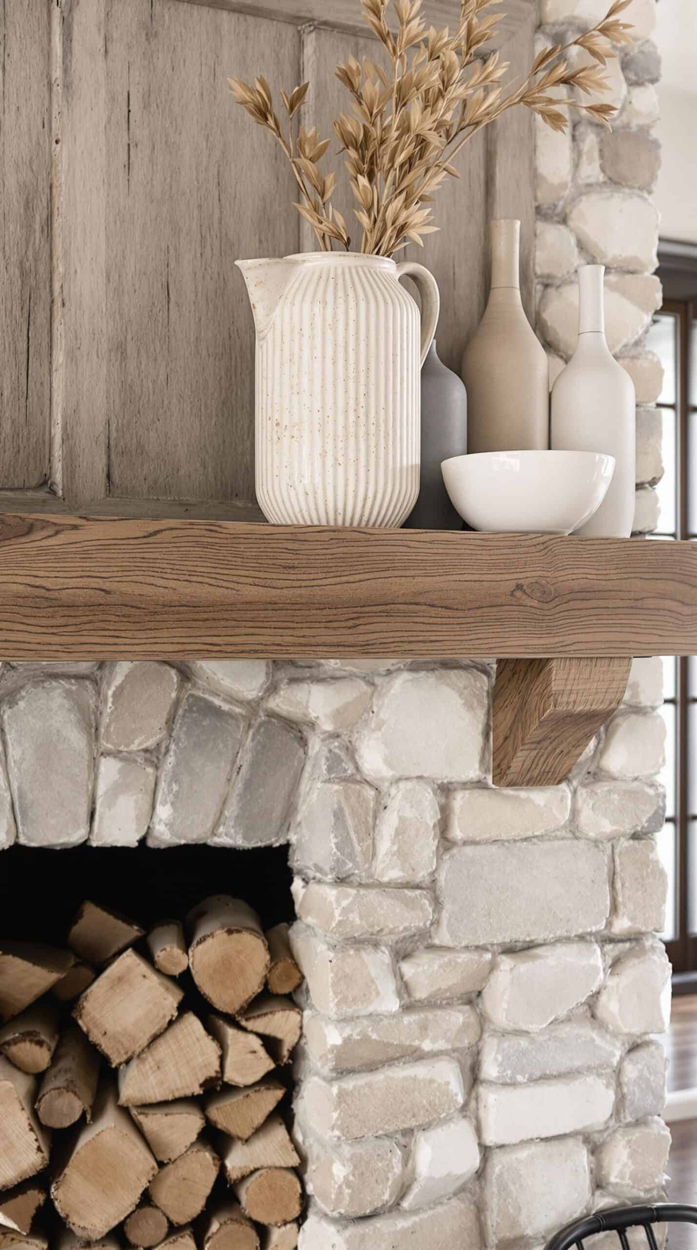 a fireplace with logs and vases on top of it